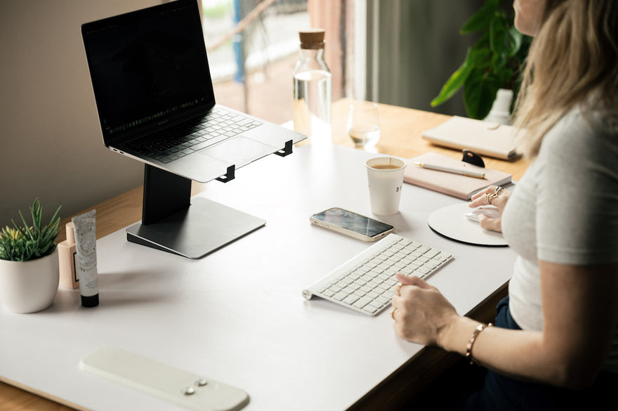 team looking at laptop