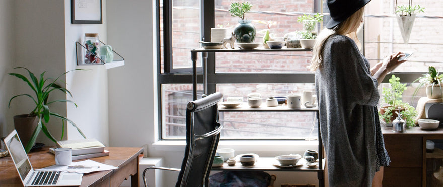 woman in office with plants