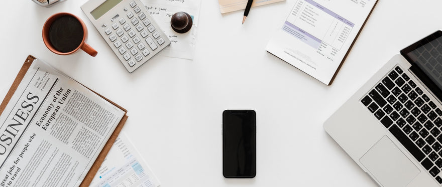desk with coffee and paper